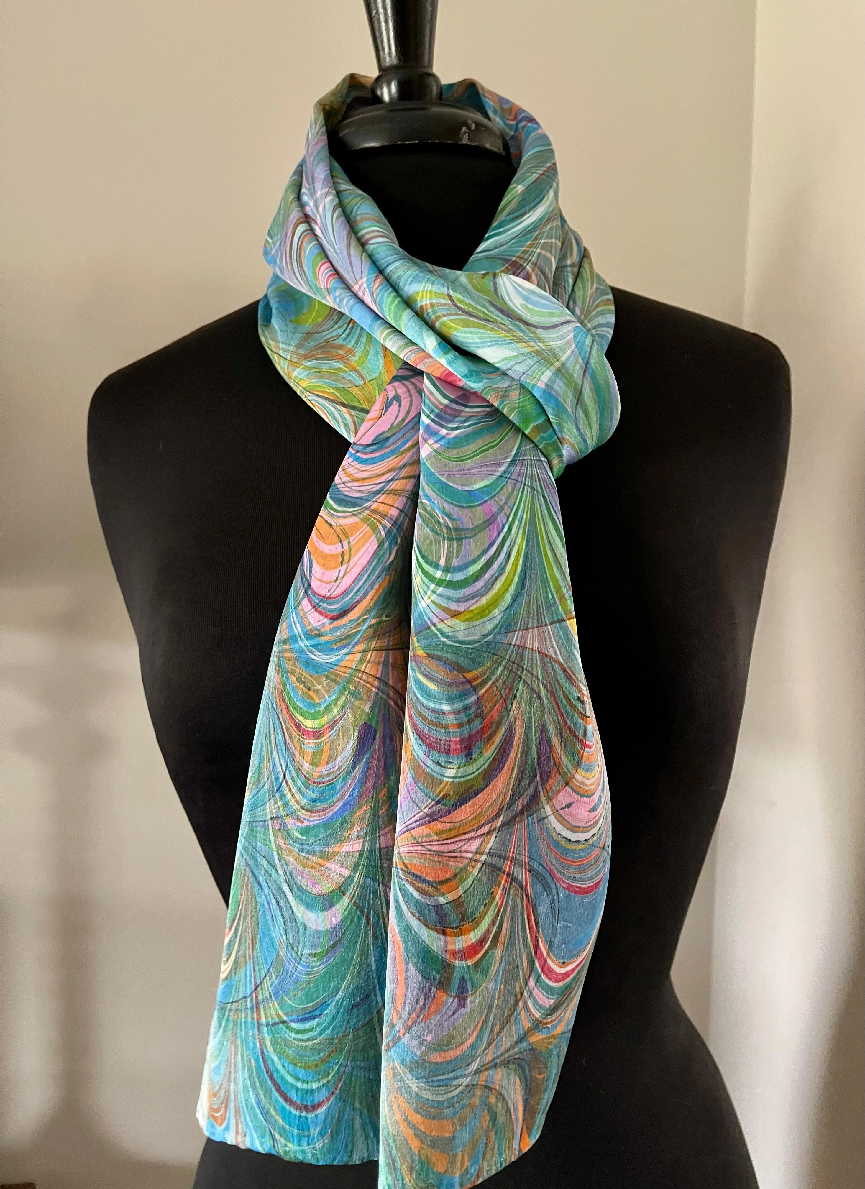 Double marbled  blue orange pink  Charmeuse  Silk 72x14” bold fun. This beautiful silk makes a unique dresser cover and scarf