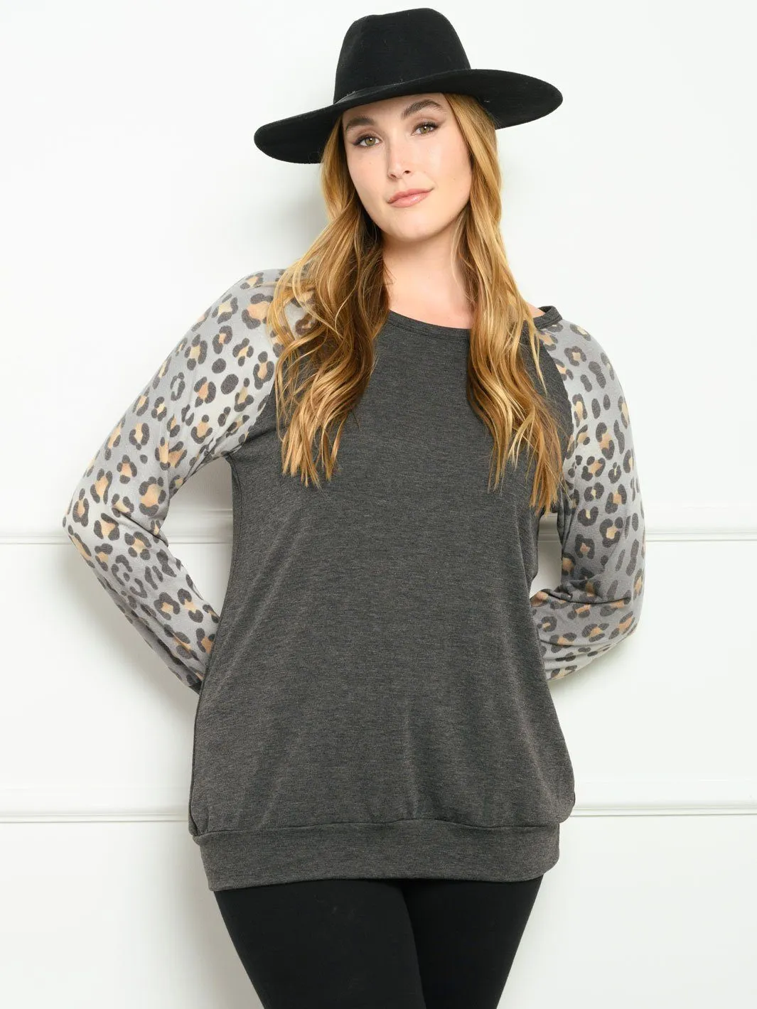 PLUS SIZE LONG SLEEVE ANIMAL PRINT SOLID TOP