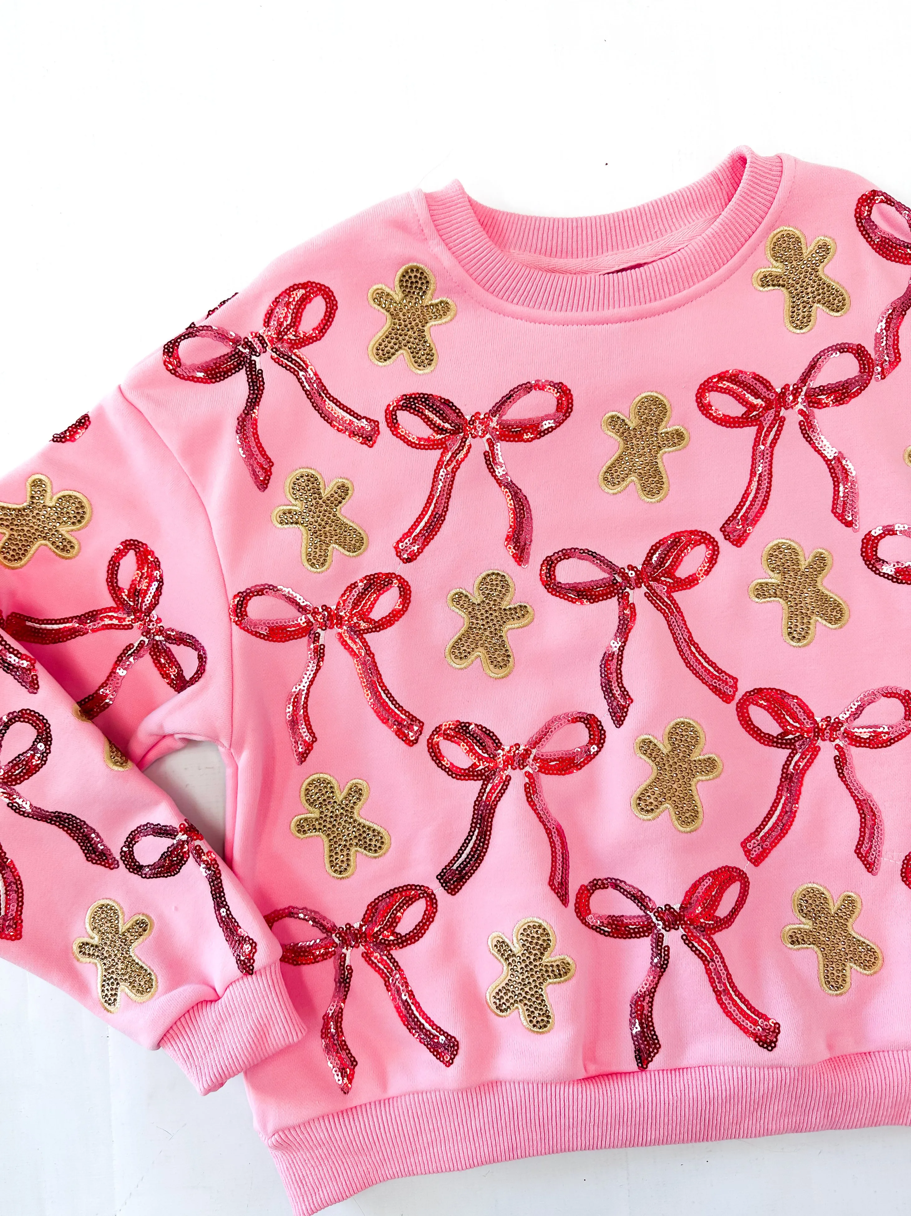 Queen of Sparkles Kids Light Pink Gingerbread Men & Bows Sweatshirt - Light Pink