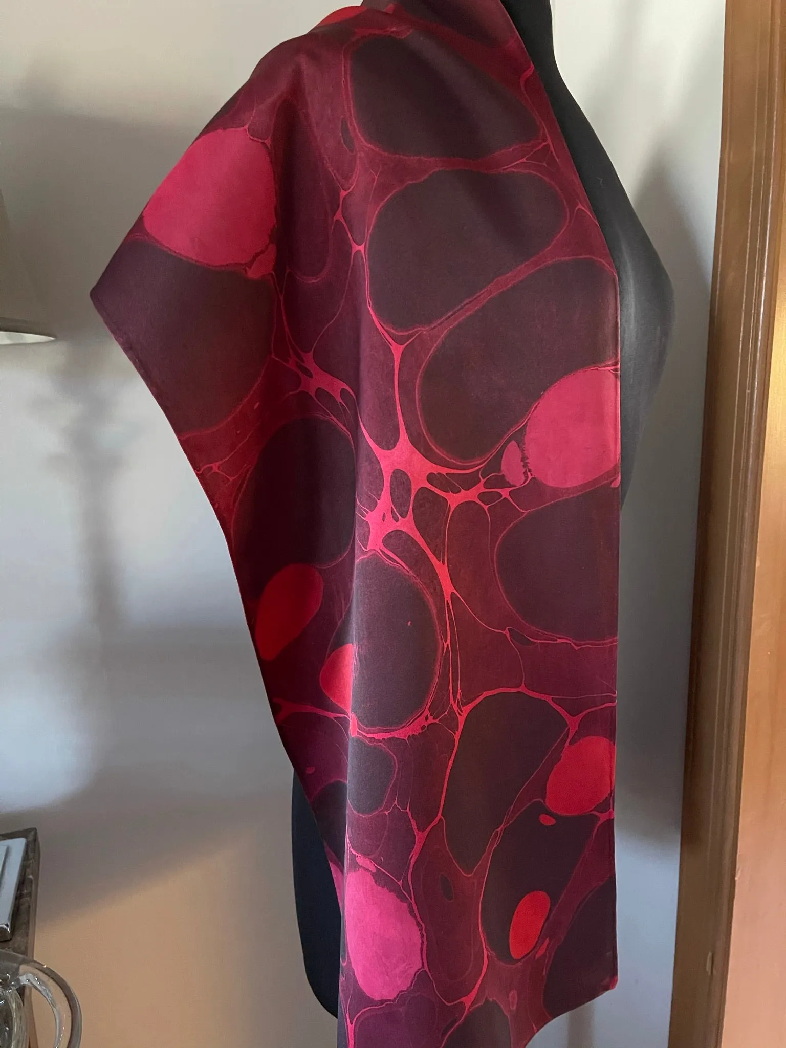 Red stone  marbled Charmeuse  Silk 72x14” bold fun. This beautiful silk makes a unique dresser cover and scarf