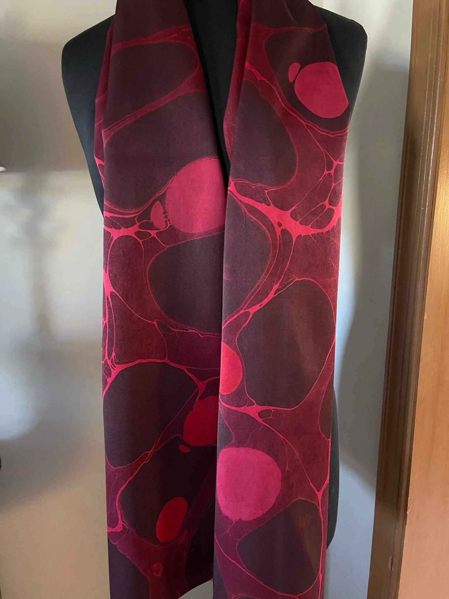 Red stone  marbled Charmeuse  Silk 72x14” bold fun. This beautiful silk makes a unique dresser cover and scarf