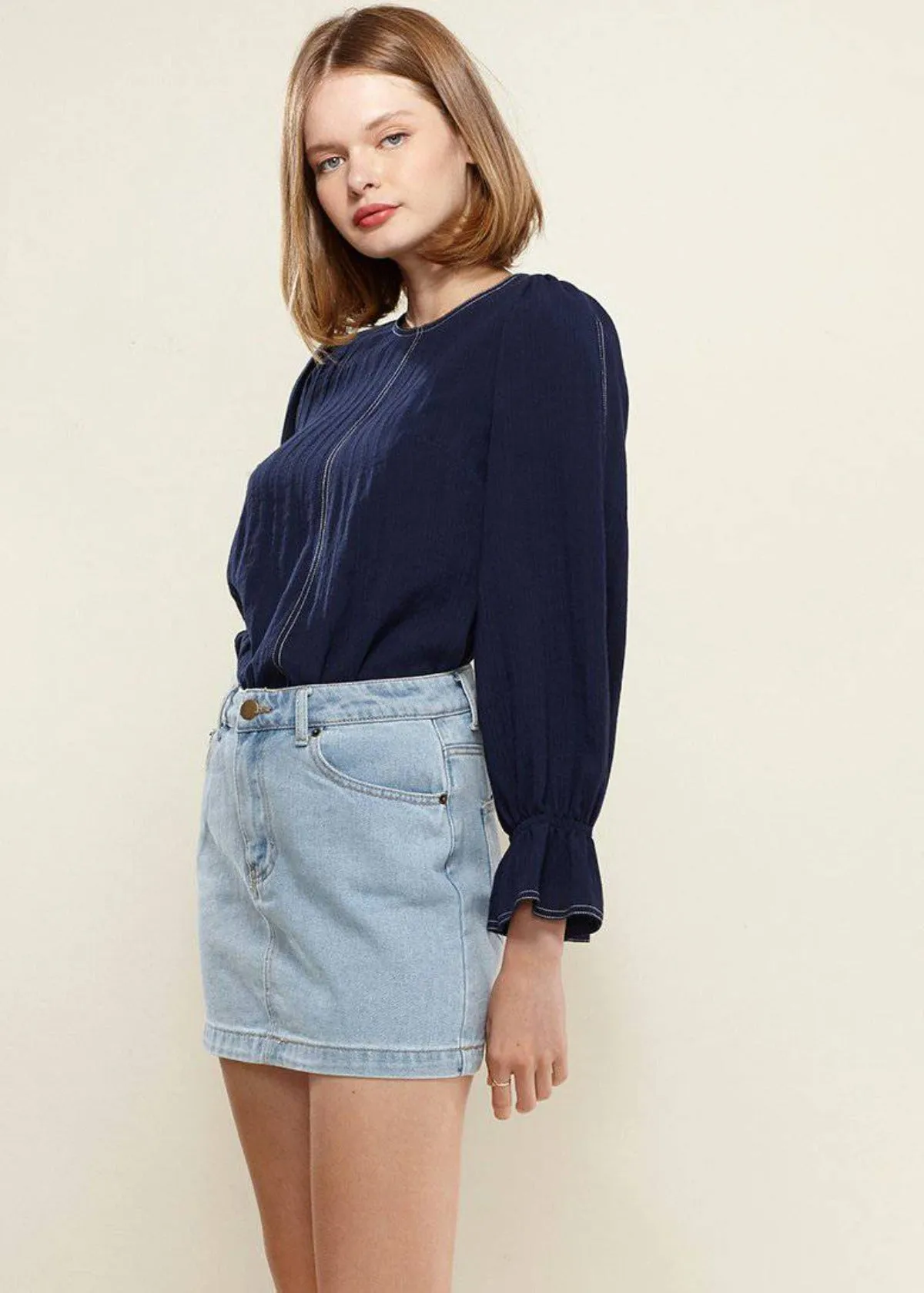 Women's Stitch Accent Puff Shoulder Bell Cuff Top in Navy